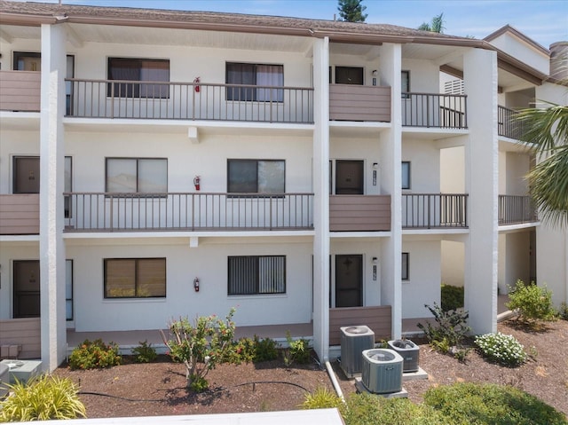 1156 Bird Bay Way Unit 104, Venice, FL 34285 - view of building exterior featuring central AC