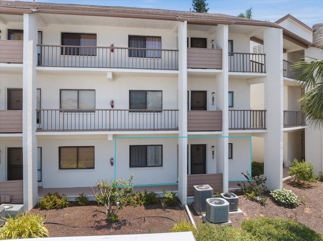 1156 Bird Bay Way Unit 104, Venice, FL 34285 - view of building exterior with central air condition unit