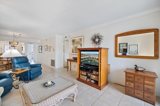 1156 Bird Bay Way Unit 104, Venice, FL 34285 - living area with light tile patterned flooring, ornamental molding, and a chandelier