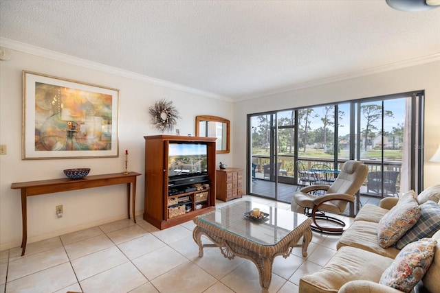 1156 Bird Bay Way Unit 104, Venice, FL 34285 - living area featuring a textured ceiling, ornamental molding, light tile patterned floors, and baseboards