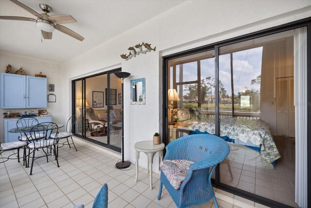 1156 Bird Bay Way Unit 104, Venice, FL 34285 - sunroom / solarium with ceiling fan