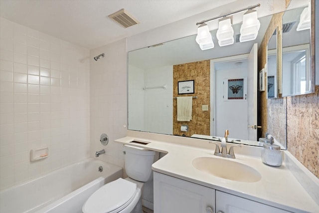 1156 Bird Bay Way Unit 104, Venice, FL 34285 - bathroom featuring toilet, shower / bathtub combination, and vanity