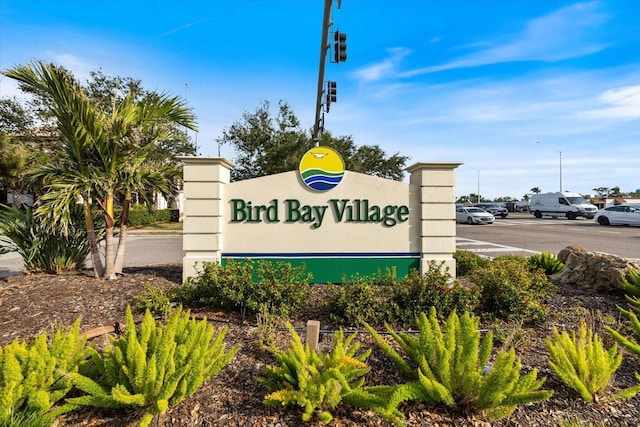 1156 Bird Bay Way Unit 104, Venice, FL 34285 - community sign with uncovered parking