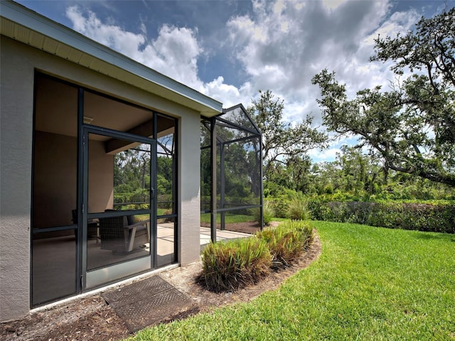 25784 Grayton Ave, Englewood, FL 34223 - view of green lawn featuring a lanai