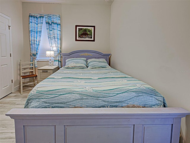 25784 Grayton Ave, Englewood, FL 34223 - bedroom with light wood-style floors