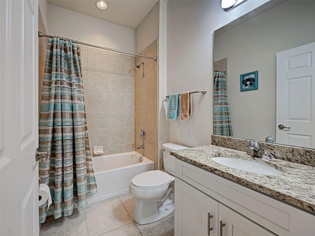25784 Grayton Ave, Englewood, FL 34223 - full bath featuring tile patterned floors, toilet, shower / bath combo, and vanity