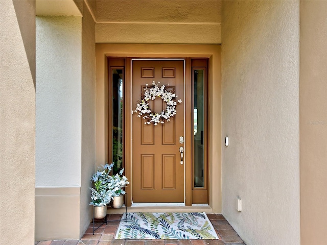 515 Sawgrass Bridge Rd, Venice, FL 34292 - property entrance with stucco siding