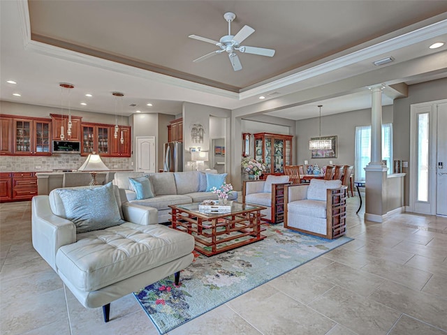 515 Sawgrass Bridge Rd, Venice, FL 34292 - living room featuring ornate columns, a raised ceiling, a ceiling fan, recessed lighting, and ornamental molding