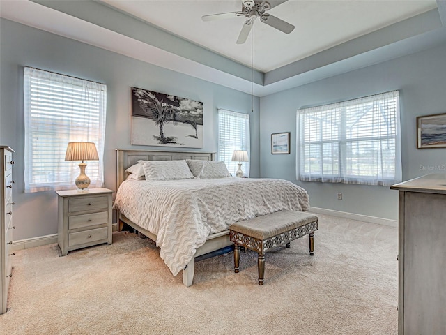 515 Sawgrass Bridge Rd, Venice, FL 34292 - bedroom with light carpet, baseboards, and ceiling fan