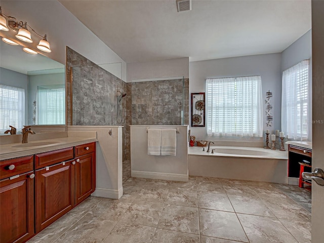 515 Sawgrass Bridge Rd, Venice, FL 34292 - bathroom featuring a walk in shower, vanity, and a bath