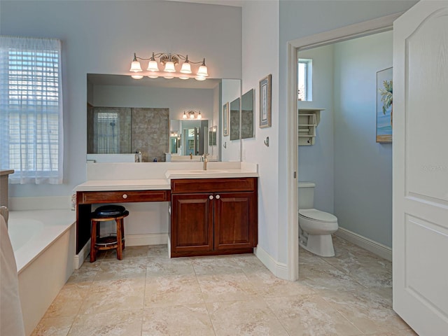 515 Sawgrass Bridge Rd, Venice, FL 34292 - full bathroom with a tile shower, toilet, a garden tub, and plenty of natural light