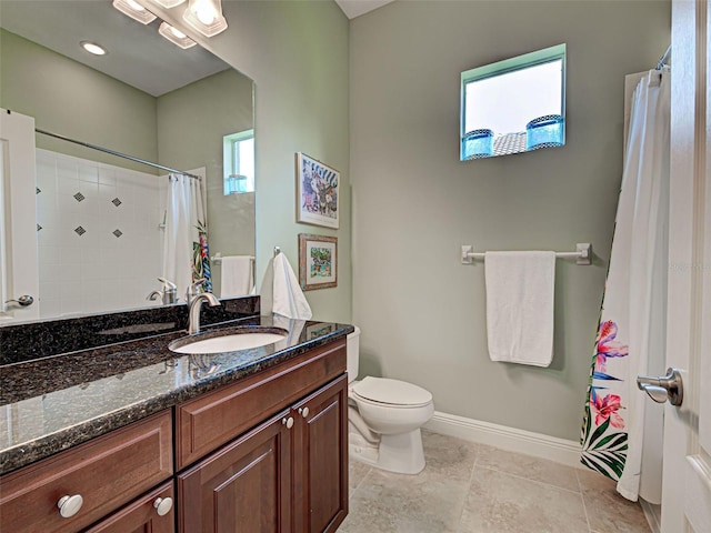 515 Sawgrass Bridge Rd, Venice, FL 34292 - bathroom featuring vanity, toilet, baseboards, and a shower with shower curtain