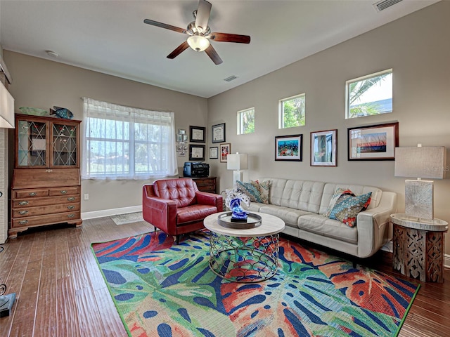 515 Sawgrass Bridge Rd, Venice, FL 34292 - living area featuring hardwood / wood-style floors, plenty of natural light, a ceiling fan, and baseboards