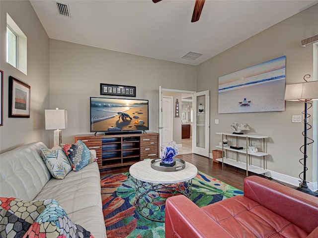 515 Sawgrass Bridge Rd, Venice, FL 34292 - living area with a ceiling fan, wood finished floors, and baseboards