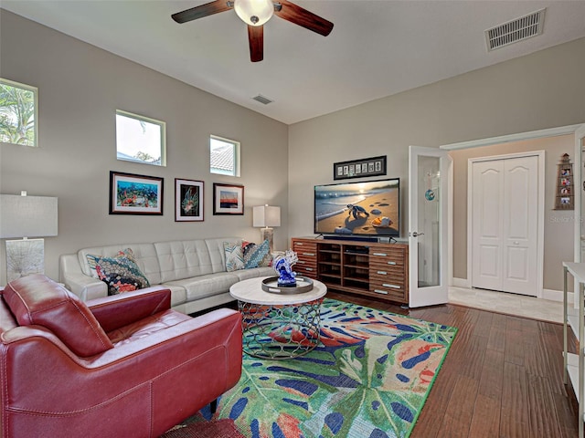 515 Sawgrass Bridge Rd, Venice, FL 34292 - living area with ceiling fan, wood finished floors, and baseboards