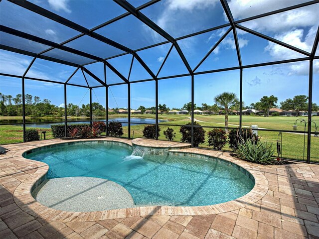 515 Sawgrass Bridge Rd, Venice, FL 34292 - swimming pool with a water view, a yard, a patio, and glass enclosure