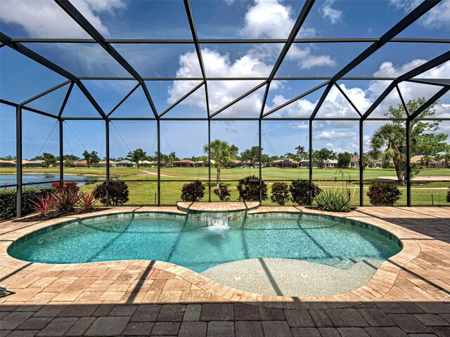 515 Sawgrass Bridge Rd, Venice, FL 34292 - outdoor pool featuring view of golf course, glass enclosure, and a patio
