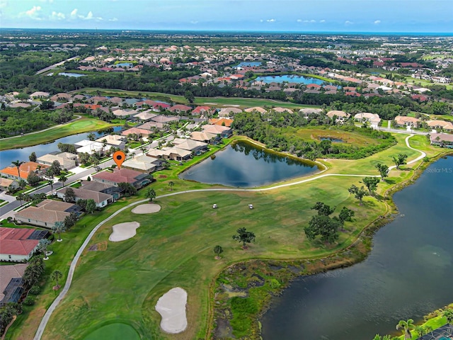 515 Sawgrass Bridge Rd, Venice, FL 34292 - aerial overview of property's location with nearby suburban area, a golf club, and a nearby body of water