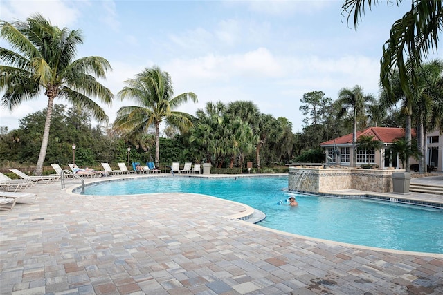 515 Sawgrass Bridge Rd, Venice, FL 34292 - community pool with a patio and view of scattered trees
