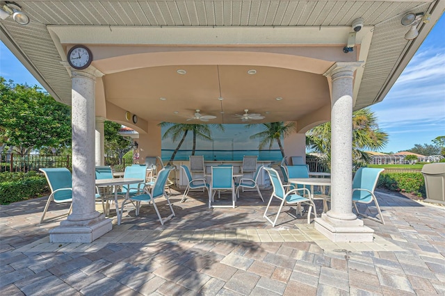515 Sawgrass Bridge Rd, Venice, FL 34292 - view of patio featuring outdoor dining space, a ceiling fan, and fence