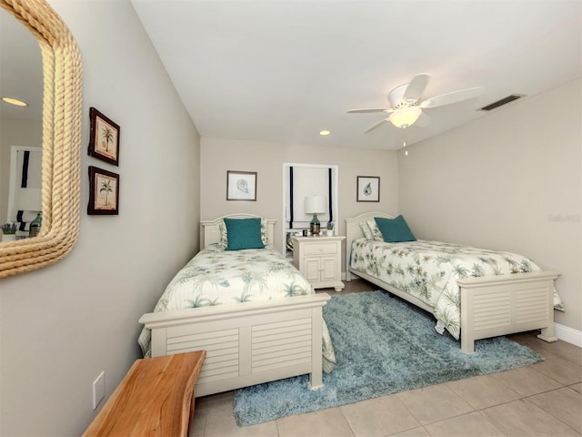 bedroom featuring a ceiling fan, recessed lighting, baseboards, and tile patterned flooring