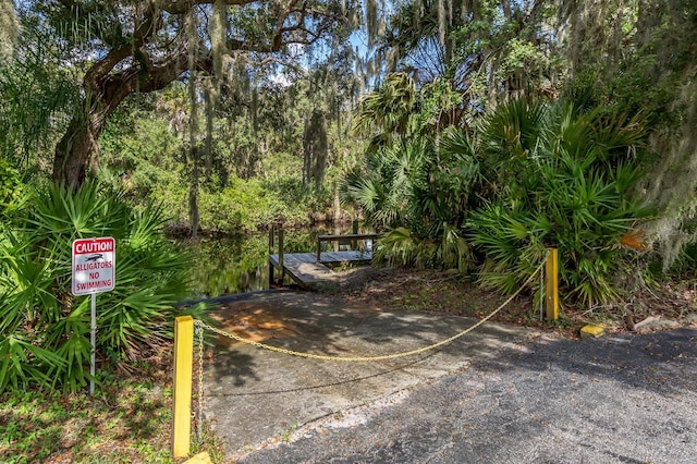 view of patio featuring a dock