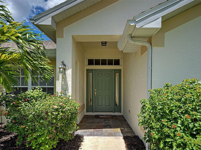 4103 Kinlock St, North Port, FL 34286 - property entrance featuring stucco siding