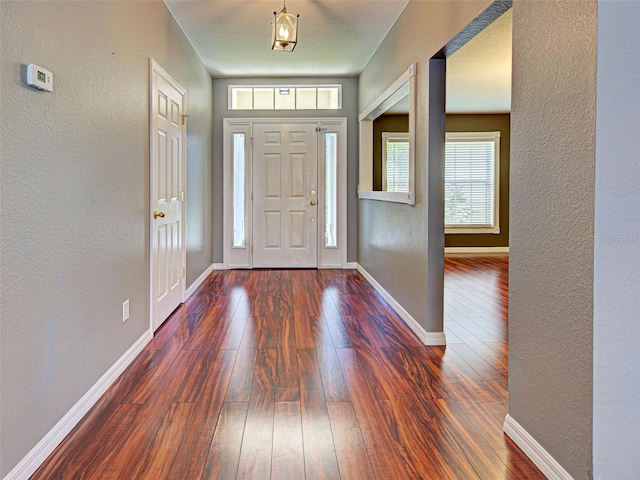4103 Kinlock St, North Port, FL 34286 - foyer entrance with hardwood / wood-style flooring and a textured wall