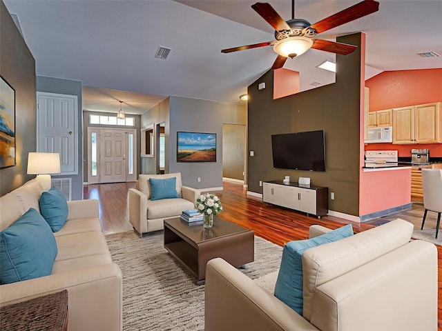 4103 Kinlock St, North Port, FL 34286 - living room featuring light wood-style flooring, a ceiling fan, and lofted ceiling