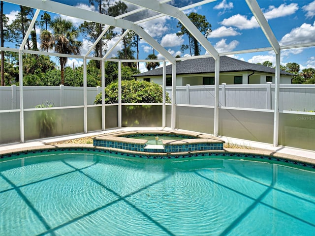 4103 Kinlock St, North Port, FL 34286 - view of pool featuring an in-ground hot tub and a lanai
