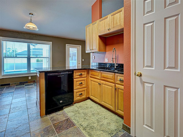 4103 Kinlock St, North Port, FL 34286 - kitchen featuring black dishwasher, a peninsula, stone tile flooring, dark stone counters, and pendant lighting