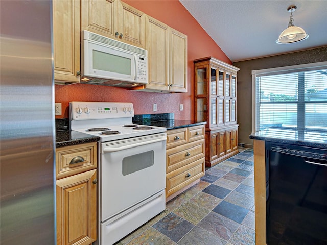 4103 Kinlock St, North Port, FL 34286 - kitchen with white appliances, lofted ceiling, dark stone finish floors, and pendant lighting