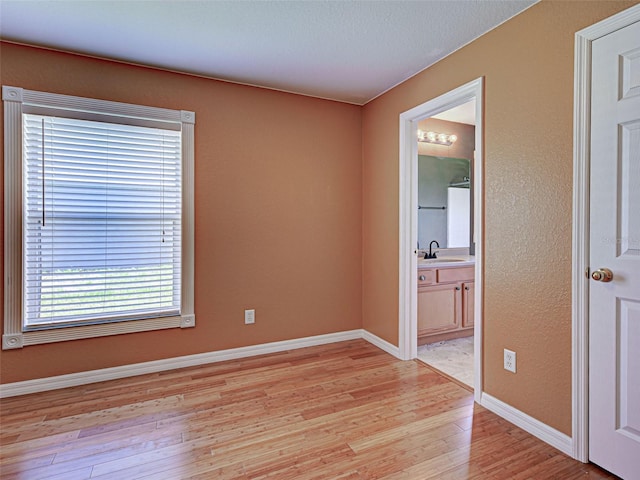 4103 Kinlock St, North Port, FL 34286 - empty room featuring light wood finished floors and baseboards