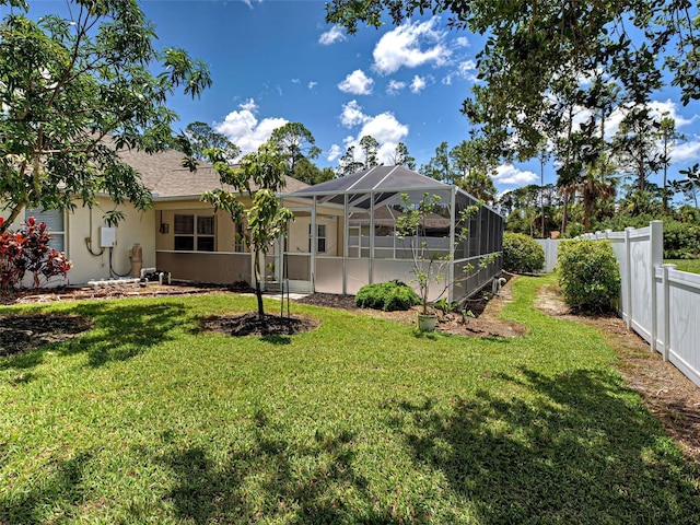 4103 Kinlock St, North Port, FL 34286 - back of property featuring a lanai and stucco siding