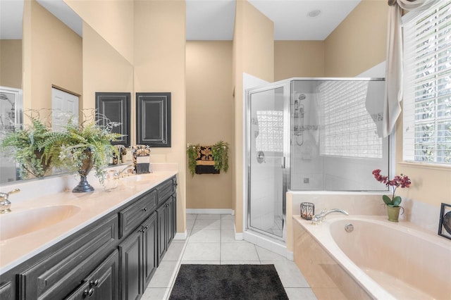 3950 Pepper Ln, North Port, FL 34287 - full bath with a stall shower, a garden tub, double vanity, and tile patterned floors