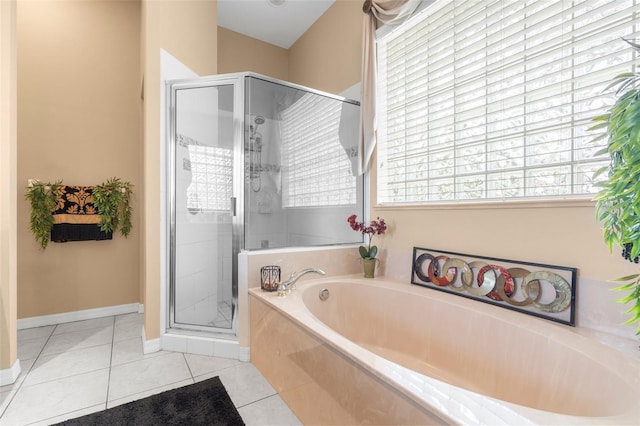 3950 Pepper Ln, North Port, FL 34287 - full bathroom with a shower stall, a bath, baseboards, and tile patterned flooring