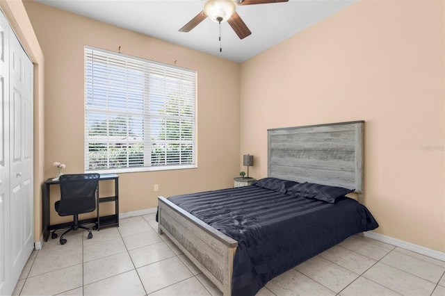 3950 Pepper Ln, North Port, FL 34287 - tiled bedroom with a closet, baseboards, and ceiling fan
