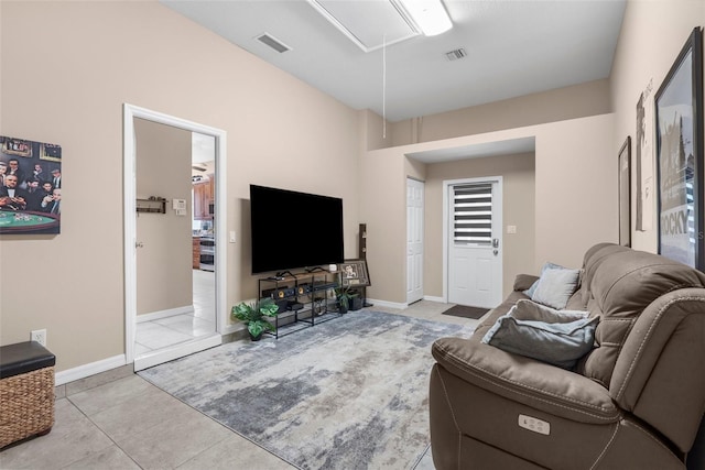3950 Pepper Ln, North Port, FL 34287 - tiled living room with attic access and baseboards