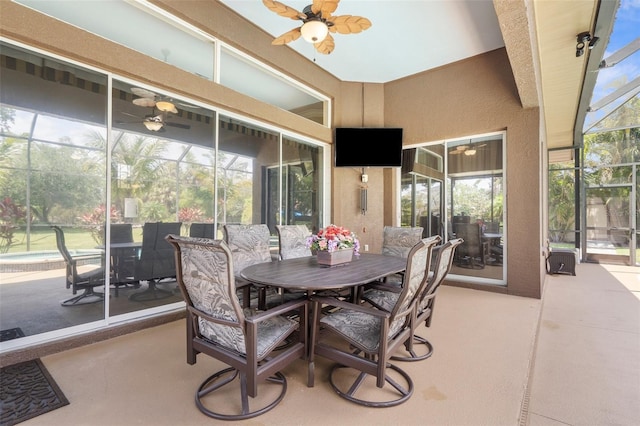 3950 Pepper Ln, North Port, FL 34287 - sunroom featuring a ceiling fan and outdoor dining space