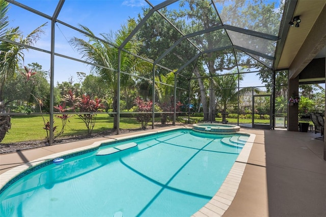 3950 Pepper Ln, North Port, FL 34287 - view of swimming pool with a lanai, a pool with connected hot tub, and a patio area