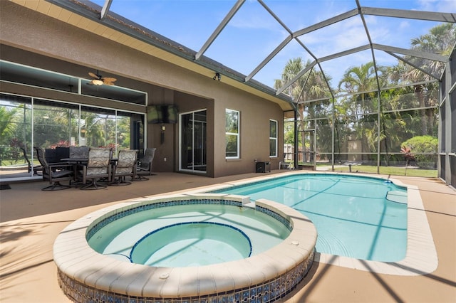 3950 Pepper Ln, North Port, FL 34287 - view of pool featuring a pool with connected hot tub, a patio area, ceiling fan, and a lanai