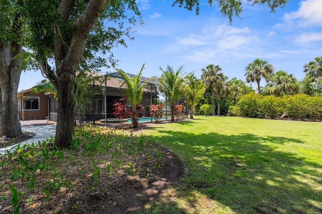 3950 Pepper Ln, North Port, FL 34287 - view of grassy yard with an outdoor pool