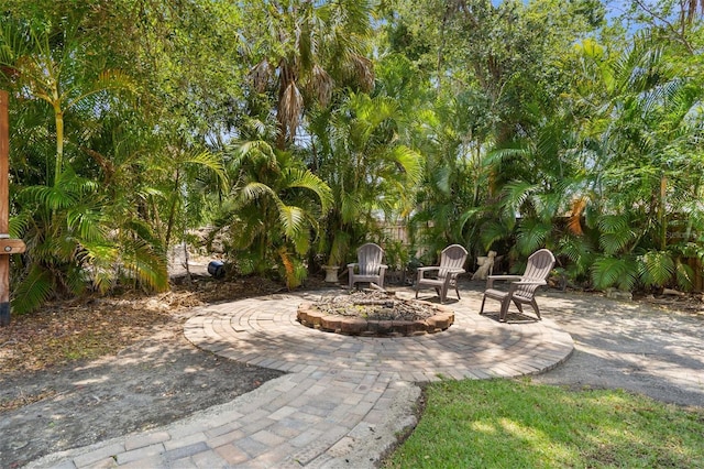3950 Pepper Ln, North Port, FL 34287 - view of patio featuring a fire pit