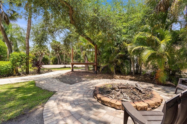 3950 Pepper Ln, North Port, FL 34287 - view of patio / terrace featuring a fire pit
