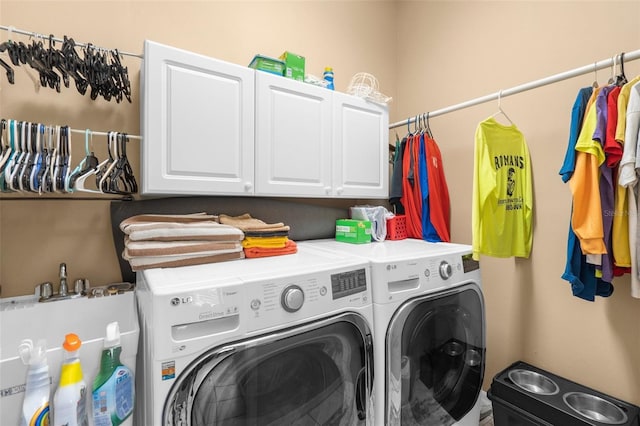 3950 Pepper Ln, North Port, FL 34287 - laundry room featuring independent washer and dryer and cabinet space
