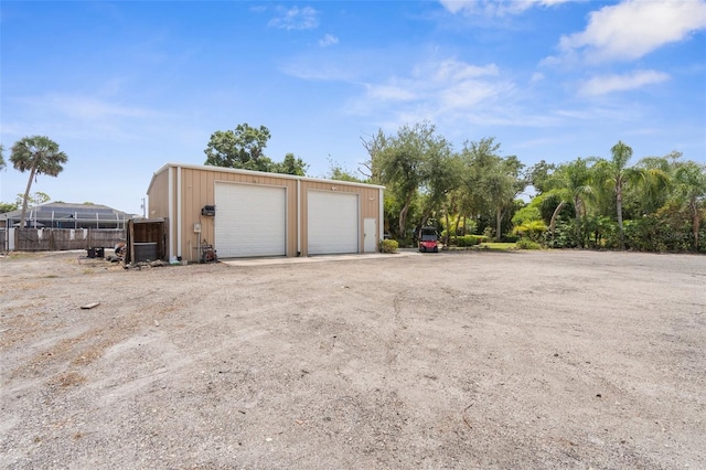 3950 Pepper Ln, North Port, FL 34287 - detached garage featuring fence