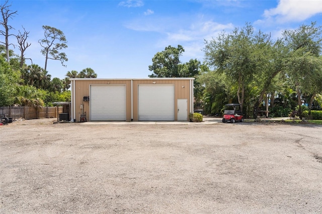 3950 Pepper Ln, North Port, FL 34287 - detached garage featuring fence