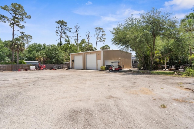 3950 Pepper Ln, North Port, FL 34287 - detached garage featuring fence