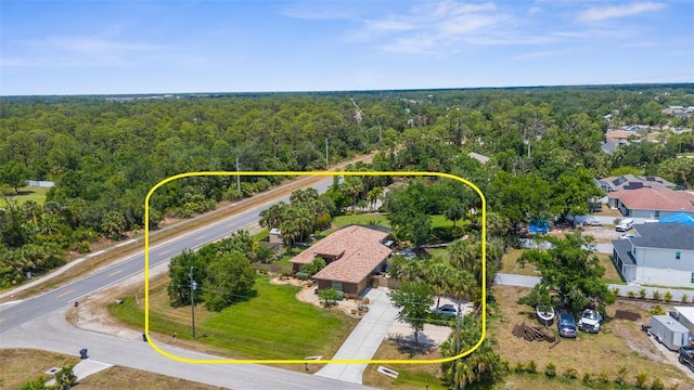 3950 Pepper Ln, North Port, FL 34287 - aerial perspective of suburban area with a heavily wooded area