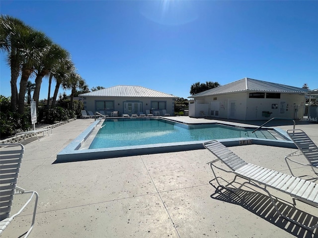 3141 Heron Shores Dr, Venice, FL 34293 - community pool featuring a patio area